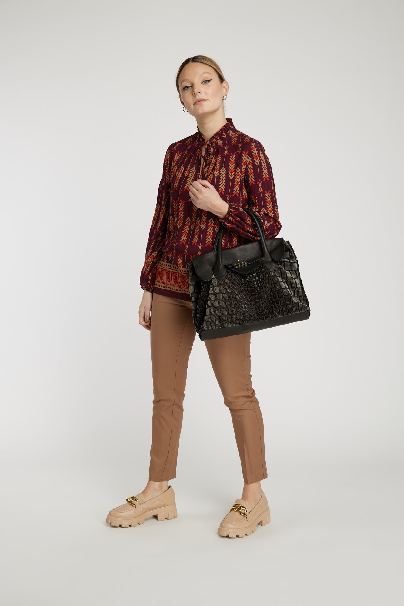 Blusa burdeo Leidiró